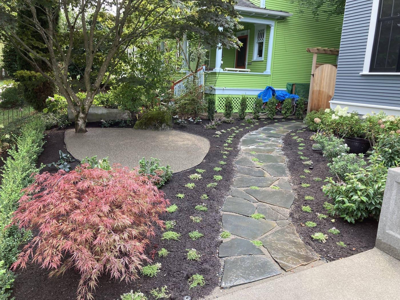 Custom planting bed with year-round structure in Greater Seattle