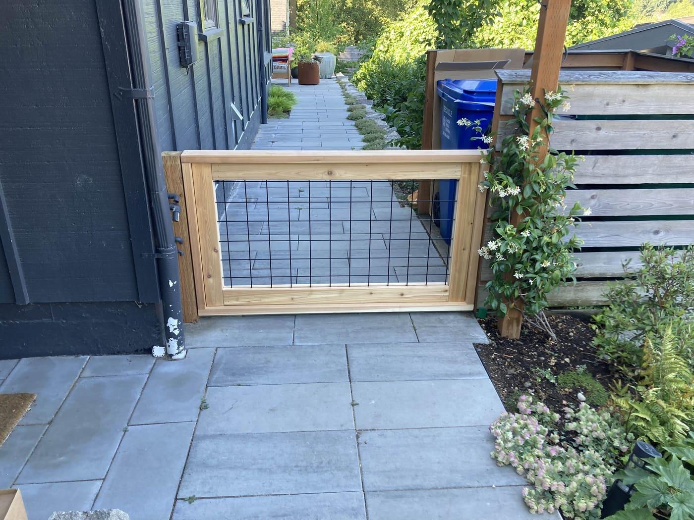 Custom horizontal-slat gate and fencing in Greater Seattle